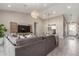 Spacious living room featuring vaulted ceilings, neutral tones, modern furniture, and stylish decor at 4846 E Piccadilly Rd, Phoenix, AZ 85018