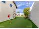 Charming putting green in a private backyard, perfect for golf enthusiasts and outdoor fun at 4846 E Piccadilly Rd, Phoenix, AZ 85018