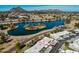 The apartment complex is surrounded by a large lake and green spaces with mountain views at 5046 N 81St St, Scottsdale, AZ 85250