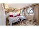 Inviting bedroom with twin beds, decor, and a large window offering scenic views at 5046 N 81St St, Scottsdale, AZ 85250