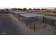 Multiple covered horse stalls offering shade and protection for livestock or equestrian property at 50702 W Hector Rd, Aguila, AZ 85320