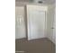 Bedroom with carpet and large sliding door closet at 5201 W Camelback Rd # A7, Phoenix, AZ 85031