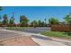 Landscaped entrance to Longhaven Estates, showcasing the well-maintained community at 5201 W Camelback Rd # A7, Phoenix, AZ 85031