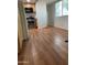 Kitchen with stainless steel oven, wood cabinets, and laminate floor at 5201 W Camelback Rd # A7, Phoenix, AZ 85031