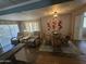 Welcoming dining area with a glass-topped table and comfortable seating, perfect for gatherings at 523 S Park View Cir, Mesa, AZ 85208