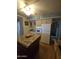 Well-maintained kitchen featuring a central island and modern appliances at 523 S Park View Cir, Mesa, AZ 85208