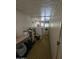 Functional laundry room with a washer, dryer, and shelving for storage at 523 S Park View Cir, Mesa, AZ 85208