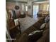 Inviting living room with comfortable seating, a large area rug, and a warm ambiance at 523 S Park View Cir, Mesa, AZ 85208