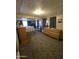 Spacious main bedroom with plush carpet, ample natural light, and dark curtains at 523 S Park View Cir, Mesa, AZ 85208