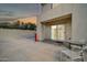 Backyard patio area with chairs and table, plus sliding glass door to home interior at 5338 N 21St Ave, Phoenix, AZ 85015