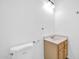 This powder room features a toilet and a sink with a cabinet underneath at 5338 N 21St Ave, Phoenix, AZ 85015