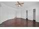 A spacious bedroom with wood floors features access to the bathroom and a walk-in closet at 5338 N 21St Ave, Phoenix, AZ 85015