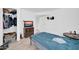 Bedroom with an open closet, a television on a dresser, and a blue bed at 5338 N 21St Ave, Phoenix, AZ 85015