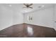 A bedroom with hardwood floors, neutral walls and a ceiling fan at 5338 N 21St Ave, Phoenix, AZ 85015