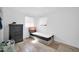 Bedroom with tile floors, dual windows, and a dark wooden dresser at 5338 N 21St Ave, Phoenix, AZ 85015