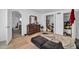 Bedroom with tile floors, a large mirror on a dresser, and access to the closet at 5338 N 21St Ave, Phoenix, AZ 85015