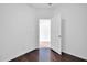 Spacious room featuring an open door and hardwood floors at 5338 N 21St Ave, Phoenix, AZ 85015