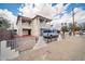 This house has a gated front yard, a two-car garage, and a second-story balcony at 5338 N 21St Ave, Phoenix, AZ 85015