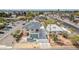 An elevated view of a two-story home that includes a gated driveway and second-story balcony at 5338 N 21St Ave, Phoenix, AZ 85015