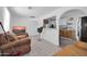 Open-concept living room showcases tile flooring, a breakfast bar, and access to the kitchen at 5338 N 21St Ave, Phoenix, AZ 85015