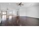 Spacious living room with a ceiling fan and hardwood floors at 5338 N 21St Ave, Phoenix, AZ 85015