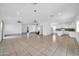 Open-concept living space with tile floors, ceiling fans, and abundant natural light at 5338 N 21St Ave, Phoenix, AZ 85015