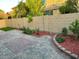 Paver patio bordered by low brick wall and desert landscaping at 61 W Hackberry Dr, Chandler, AZ 85248