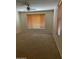 Bedroom with neutral carpet, multiple windows with blinds and a ceiling fan at 61 W Hackberry Dr, Chandler, AZ 85248