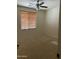 Carpeted bedroom featuring a window with blinds and neutral paint at 61 W Hackberry Dr, Chandler, AZ 85248