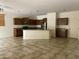 Spacious kitchen with abundant wood cabinets and granite counters at 61 W Hackberry Dr, Chandler, AZ 85248
