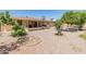 Expansive backyard features low-maintenance landscaping and a covered patio perfect for outdoor living at 6217 E El Paso St, Mesa, AZ 85205