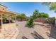 Landscaped backyard features low-maintenance desert landscaping and a covered patio at 6217 E El Paso St, Mesa, AZ 85205