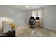 Spacious bedroom with carpet flooring, a ceiling fan, and a large closet at 6217 E El Paso St, Mesa, AZ 85205