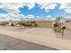 Charming single-story home showcasing a well-maintained front yard and a two car garage at 6217 E El Paso St, Mesa, AZ 85205