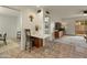 Open living space with a breakfast bar and views to other rooms at 6217 E El Paso St, Mesa, AZ 85205