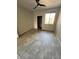 Bedroom featuring tile flooring, a ceiling fan, and a closet at 7009 E Acoma Dr # 1101, Scottsdale, AZ 85254