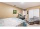 Cozy bedroom includes double closet, ample floor space and bright natural light at 11381 E Poinsettia Dr, Scottsdale, AZ 85259