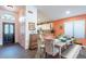 Home features a dining area adjacent to the kitchen with views to the front entryway at 11381 E Poinsettia Dr, Scottsdale, AZ 85259