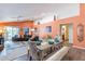 Spacious living area features a dining table with an adjacent living room and lots of natural light at 11381 E Poinsettia Dr, Scottsdale, AZ 85259