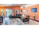 Comfortable living space with an oversized sectional, modern decor, and open layout at 11381 E Poinsettia Dr, Scottsdale, AZ 85259