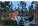 Aerial view of community pool nestled among lush trees at 12212 N Paradise Village Pkwy # 308, Phoenix, AZ 85032