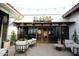 A cozy restaurant patio features comfortable seating outside Blanco Cocina + Cantina at 12212 N Paradise Village Pkwy # 308, Phoenix, AZ 85032