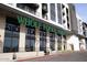 Exterior shot of the Whole Foods Market store with large glass windows and modern signage at 12212 N Paradise Village Pkwy # 308, Phoenix, AZ 85032