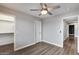 Spacious bedroom with vinyl floors, ceiling fan and closet at 14333 W Lexington Ave, Goodyear, AZ 85395