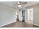 This bedroom offers easy access to a closet and an ensuite bathroom at 14333 W Lexington Ave, Goodyear, AZ 85395