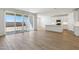 Spacious living room with lots of natural light and an open floor plan to the kitchen at 15362 W Cottontail Ln, Surprise, AZ 85387
