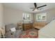 Bright Bedroom with shuttered windows, a wood crib, changing table, and comfortable sitting chair at 1716 N 32Nd Pl, Phoenix, AZ 85008