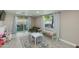 Bright and airy living room with a slider to the backyard, playroom, and neutral color scheme at 1716 N 32Nd Pl, Phoenix, AZ 85008