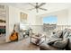 Cozy living area with comfortable seating, entertainment center, and large window with scenic view at 1821 W Vermont Ave, Phoenix, AZ 85015