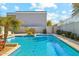 Sparkling blue pool surrounded by desert landscaping, offering a refreshing oasis for relaxation and recreation at 1821 W Vermont Ave, Phoenix, AZ 85015